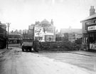 View down Cross Street, Woodhouse, looking towards gable of Nos. 1, 3 and 5, Handsworth Woodhouse Industrial Co-operative Society. James Hall and Son, grocers, extreme right