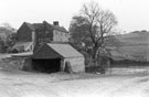 Lees Hall Farm and duck pond from approach road. From left to right can be seen a Humber Snipe car, an ex-Army Staff car, a flat bed trailer, a Nissan Hut and an Anderson Shelter. The common ash still stands (1997)