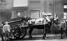Decorated horse drawn cart belonging to Thomas W. Ward outside Longbottom and Co., Rowland Street Decorated horse drawn cart belonging to Thomas W. Ward outside Longbottom and Co., Rowland Street