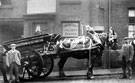 Decorated horse drawn cart belonging to Thomas W. Ward outside Longbottom and Co., Rowland Street