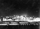 View: u04333 Elevated night time view from Park Hill Flats including Sheffield Midland railway station (foreground), Sheaf House (extreme left), Sheaf Square Fountain, Pond Street Bus Station (right) and Sheffield Hallam University Buildings (centre)