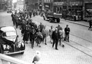 Lord Mayor Alderman E G Rowlinson and Lady Mayoress  Kathleen Rowlinson leading the Sheffield pilgrimage to the French and Belgian battlefields through Ypres to the Town Hall