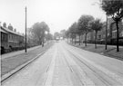 Stubbin Lane looking towards Barnsley Road showing part of the tramtracks covered (bottom) Stubbin Lane looking towards Barnsley Road showing part of the tramtracks covered (bottom)