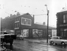 Hartley Marsland Ltd., office furnishers and Hartley and Son Ltd., printers and stationers, Nos. 566-8; entrance to Courts 24 and 26 and No. 548 Robin Hood public house (extreme right), Attercliffe Road