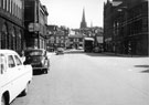 View: u04580 No. 120, The Hostel (extreme left) and Nos. 121/5 Sheffield Hosiery Company Ltd., wholesalers, West Bar at  the junction with Lambert Street looking towards West Bar Green and Mosely's  Arms with the Cathedral Spire in the background
