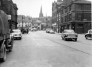 Nos. 121/5 Sheffield Hosiery Company Ltd., wholesalers, West Bar at  the junction with Lambert Street looking towards West Bar Green and Mosely's  Arms with the Cathedral Spire in the background