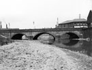Washford Bridge (also known as Attercliffe Bridge), Attercliffe Road over the River Don looking downstream showing Warwickshire Furnishing Co. Ltd. (right)