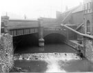 View: u04636 Sheaf Street over the River Sheaf looking upstream showing Joseph Rodgers and Sons Ltd., cutlery manufacturers, Sheaf Island Works, junction of Sheaf Street and Pond Hill