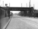 West Tinsley Railway Bridge, Sheffield Road looking towards Nos. 98-120 (right)and Edgar Allen Co. Ltd. Offices (left)