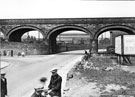 Meadowhall Railway Viaduct, Meadowhall Road and the junction of Barrow Road with Yorkshire Engine Co. Ltd., Meadowhall Works, locomotive engineers in the background