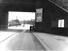 Prince of Wales Railway Bridge looking towards Poole Place, showing the narrow footway and the notice board advertising rail excursions to Cleethorpes and Mablethorpe
