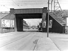 Prince of Wales Railway Bridge looking towards Darnall showing the narrow footway and entance to Darnall Engineering Works (right)