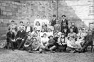 Summer Holidays held under the auspices of the National Homes Reading Union at Abbey House, Whitby 1896 with A.E. Upton recining on the front row