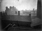 View over the rooftops of property on Castle Street looking towards No. 30 The Cannon public house (originally Cannon Spirit Vaults with the tall chimneys left) and