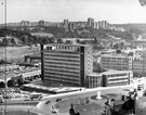 View: u05152 Elevated view of Sheaf Square roundabout showing Sheffield Midland railway station forecourt; Sheaf House; Dyson House with construction of Claywood Flats in the background 	(left) and Norfolk Park Flats in the background