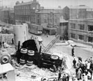 Accident with a portable crane, Eyre Street opposite No. 121, T.C. Vere Ltd., basket manufacturers , Duke Lane is visible at the side of Vere's and Arnold Carter and Co. Ltd., builders and plumbers merchants, Trinity Works (left)
