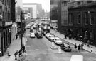 Elevated view of evening traffic in Castle Street with the Court House, formely the old Town Hall  (right); Arthur Davy and Son Ltd., provision merchants and Cannon Hotel (left)