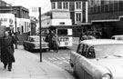 Passengers alighting from the No. 59 bus, Charles Street near the junction with Union Street, Brookshaw Ltd.  in the background left and Phoenix Hotel in the background right