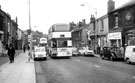 Evening rush hour, Ecclesall Road showing No. 121 Eric Waterall, pork butcher   