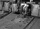 Rolling steel at Hallamshire Steel and File Company Ltd., Hallamshire Works, No. 107 Neepsend Lane