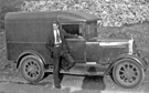 Stanley Allen of Cow Gap Farm, Load Brook, Dungworth who used this van for his milk round in Sheffield, photograph probably taken in Derbyshire with the Limb Stone in the background