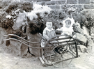 Unnamed Children in a handcart