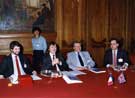 Clive Betts, City Council Leader and President of the Organising World Student Games Committee (2nd left) during a Signing Ceremony with Banque Paribas with Councillor Howard Knight left