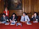 Clive Betts, City Council Leader and President of the Organising World Student Games Committee (extreme right) during a Signing Ceremony with Banque Paribas