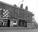 Nos. 433 extreme left; 435 former premises of Lant's (Lewis Lant) fish and chips shop; 437, Goverment Surplus Clothing with 439 extreme right, Attercliffe Common at the junction with Carbrook Street Nos. 433 extreme left; 435 former premises of Lant's (Lewis Lant) fish and chips shop; 437, Goverment Surplus Clothing with 439 extreme right, Attercliffe Common at the junction with Carbrook Street