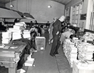 View: u06343 Librarians sorting a large amount of Library Books taken to Attercliffe Police Station, Whiworth Lane. 