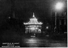 Night view of Sheffield Corporation Tramways and Motors Enquiry Office, Moorhead next to Crimean Monument
