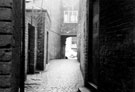 Alley off West Bank Lane looking towards West Street and rear of No. 54 Alley off West Bank Lane looking towards West Street and rear of No. 54