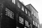 View: v00459 Bailey Lane off West Street, Premises include Nos. 100-104 West Street, Morton Scissors, scissors manufacturers (side view), No. 2 W. and K.R. Sanderson, shopkeepers