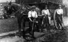 Muck spreading on William Maycock's farm on Fife Street (formerly Fowler Street), Ronnie Ball and his brother with Eddie Maycock leaning on the cart-wheel, Jedburgh Street in the background