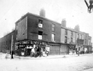 Moorfields at the junction with Ebenezer Street showing No. 270, Turner' s Executors Ltd., pawnbrokers, No. 264, Levi Abrahams, tailor and No. 262, Boots Cash Chemists
