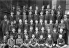 Class photograph, teacher Mr. Dobson (right) and headteacher, Mr. Fletcher (left), Shiregreen Council School, Bracken Road, High Wincobank