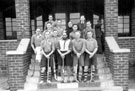 English Steel Corporation hockey team on the steps of the pavilion, English Steel Corporation sports ground, Shiregreen Lane, 1950's with Bob Short player extreme right back row and Singh, captain centre front