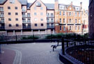 Riverside Walk behind the old Exchange Brewery looking over to the new appartment block and the former William and Glyn's Bank