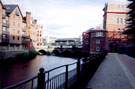 Riverside Walk behind the old Exchange Brewery (right) looking over to the new apartment block and the former William and Glyn's Bank