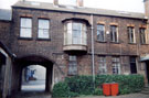 The entrance to the yard and managers bow windowed office of the former Joseph Pickering and Sons Ltd., white shoe cleaner manufacturers, Albyn Works, Burton Road, Neepsend