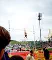 Nick Buckfield, Crawley A.C. attempting a height in the Mens Pole Vault, AAA's Championships, Don Valley Stadium with Kate Staples alias Zodiac from the tv's Gladiators with the plaits watching