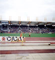 Colin Jackson on his lap of honour, McDonalds International Athletics Meeting, DonValley Stadium with the windsock showing the strength of the wind for the pole vaulters