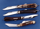 Lock-knives and exhibition stock-knife, with buffalo horn and stag handles by Stan Shaw