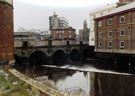 River Don at Lady's Bridge with former Exchange Brewery (right) looking towards the Tap and Barrel public house (formerly Bull and Mouth) and Old Town Hall, Waingate with Castle Market in the background taken from Nursery Street
