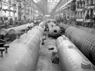English Steel Corporation, River Don Works, South Machine Shop. Group of completed boiler drums and pressure vessels.