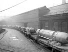 English Steel Corporation, River Don Works, South Machine Shop. Nine boiler drums, outside the machine shop, loaded for dispatch to the East.