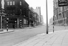 The junction of Norfolk Street and Surrey Steert with the Council Department Offices (left) and the rear of the Town Hall (right)