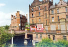 Carpet Roll End Centre, No. 3 Lady's Bridge and Royal Exchange Flats from Castlegate looking towards Lady's Bridge showing the old inlet to the Tower Water Wheel (next to the bridge)