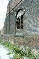 Remnent window and wall of Brightside Works from Weir Head, Five Weirs Walk