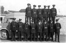 Firemen from Elm Lane Fire Station showing (1st left, front row) Mr. Doyle with glasses